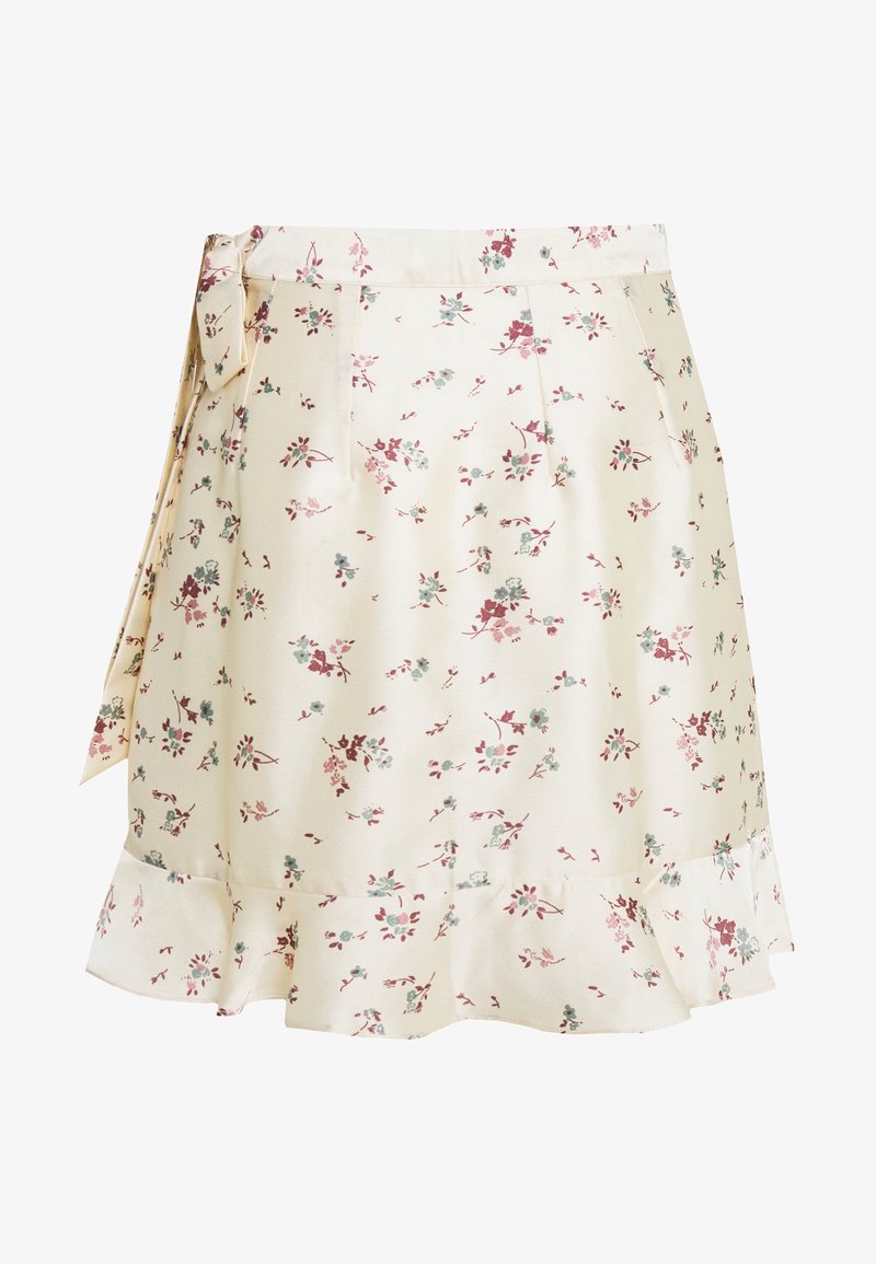 Jupe à imprimé floral en crème, ornée de fleurs pastel. Conçue avec un ourlet volanté et un détail de taille noué. Matière douce et légère.