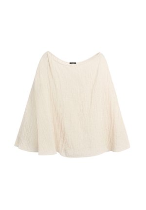 Weites, off-white, strukturiertes Poncho mit weitem Ausschnitt und fließendem, asymmetrischem Saum vor einem schlichten weißen Hintergrund.