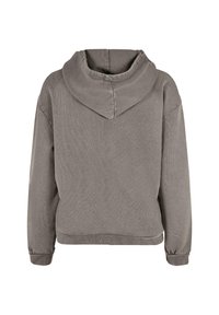 Grå hoodie med en stor, mjuk huva. Har långa ärmar, ribbade muddar och en avslappnad passform. Materialet ser ut att vara strukturerat och avslappnat.