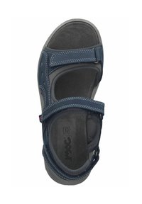 Námořnické modré sandály s suchými zipy, polstrovanou stélkou a gumovou podrážkou. Disponují texturovaným povrchem a kontrastním prošíváním.