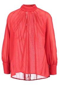 Blouse longue rouge transparente à manches longues, col montant, encolure froncée et larges poignets, avec un motif discret à pois.