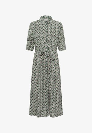 Blumenkleid mit kragenförmigem Ausschnitt, kurzen Ärmeln und einem Bindegürtel. Hat einen grünen Hintergrund mit kleinen lila und weißen Blumen.