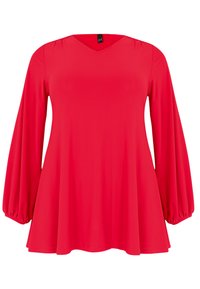 Blouse rouge à manches longues avec un décolleté en V, des manches volumineuses et une silhouette fluide. Fabriquée en tissu lisse, avec des poignets élastiqués.
