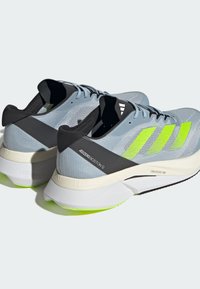 adidas Performance ADIZERO BOSTON 12 - Chaussures de running sur route - blue/lucid lemon