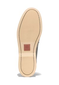 Grå skosula med strukturerad beige gummi, med en rosa fyrkantig accent som har "Cole Haan"-logotypen, och horisontella räfflor för grepp.