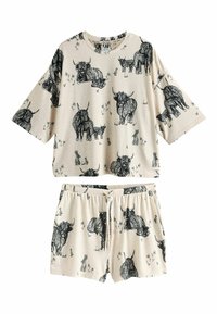 Set de haine lejere cu mânecă scurtă bej, decorat cu schițe negre de animale, inclusiv vaci și iepuri. Pantaloni scurți cu talie elastică și croială lejeră.