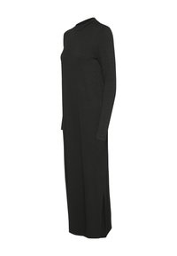 Black long-sleeve dress with a high neck, made of textured fabric. Features a straight cut and side slits for ease of movement.