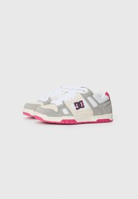 Gray suede and white mesh sneakers with pink accents, round toe, DC logo in black on the side, and a textured pink rubber outsole.