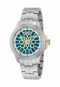 Ceas din oțel inoxidabil argintiu cu un cadran cu model teal, accente aurii și un bezel texturat. Dispune de o brățară metalică legată.