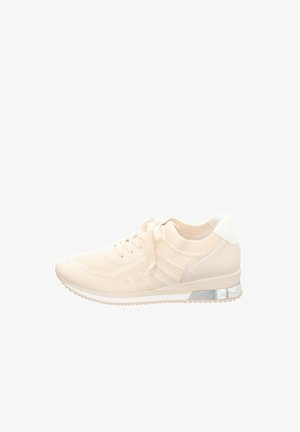 Beige knit sneakers with a textured upper, lace closure, and a white heel accent. Features a reflective silver heel detail and rubber sole.