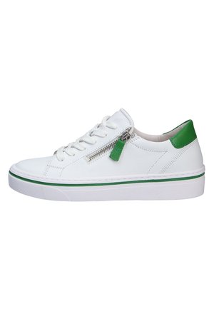 White leather sneaker with green accents, flat white sole, round toe, and textured detailing. Features a side zipper with green pull tab.