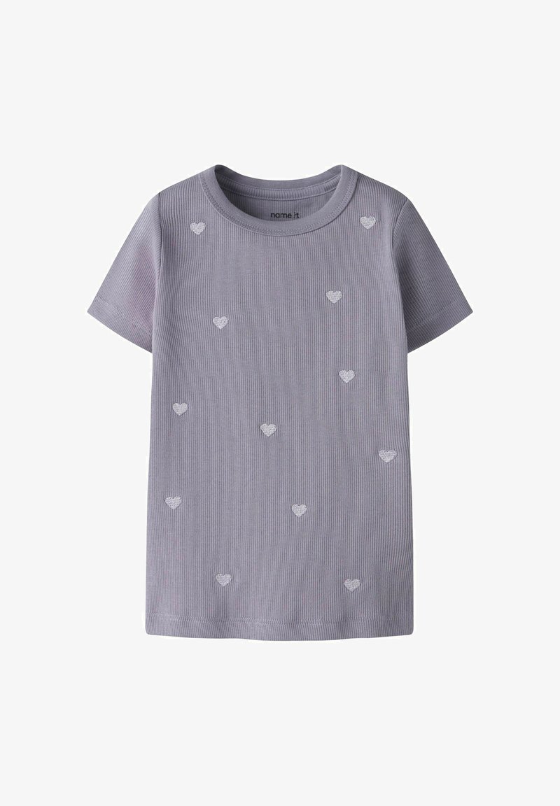 Chemise courte à manches courtes en tissu côtelé violet clair avec de petits cœurs blancs brodés éparpillés sur le devant.