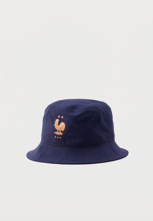 Chapeau bob bleu marine avec un emblème de coq doré, deux étoiles au-dessus et l'inscription "FFF" en dessous à l'avant.