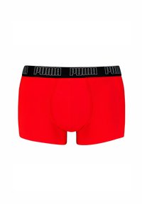 Boxer shorts rossi realizzati in tessuto morbido, con un elastico nero in vita recante il logo bianco "PUMA". Senza pattern o accenti visibili.