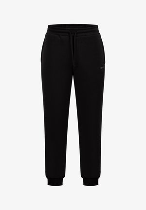 Schwarze Sweatpants aus Baumwolle. Verfügt über einen elastischen Bund, eine Kordel, Seitentaschen und eng anliegende Bündchen. Glatte Textur, keine Muster.
