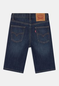 Levi's® PERFORMANCE - Jeansshorts - dark blue denim
