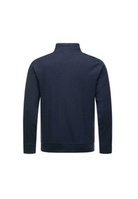 Pullover blu navy con colletto alto, maniche lunghe e polsini a coste. Realizzato in tessuto testurizzato, presenta un orlo dritto in vita.