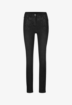 Zwarte skinny jeans met diepe voorzakken, knoopsluiting en verspreide kleine zilveren studs die het bovenste voorgebied versieren.