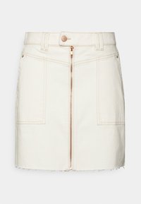 Krämfärgad denimkjol med dragkedja framtill, två framfickor och fransar vid fållen. Utformad med en figurnära silhuett och minimalistiska detaljer.