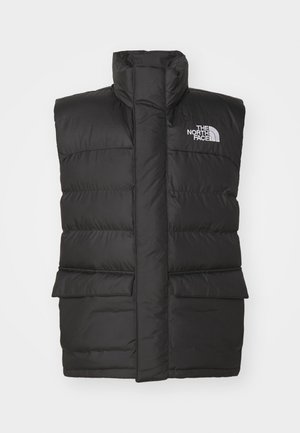 Gilet rembourré noir avec un col haut, doté d'une fermeture éclair à l'avant, de deux poches avant et d'un logo sur la poitrine. Texture lisse, design épuré.