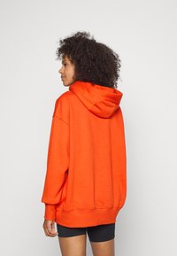 Nike Sportswear HOODIE - Camisola - mantra orange