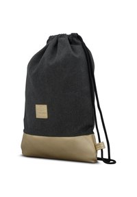 Dragsko-ryggsäck i mörkgrått tyg med en botten i guldfärgat konstläder. Har en logotypmärke och svarta snören för stängning.