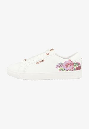 White sneaker with embossed floral design in pink and green on the side, featuring light-colored laces and rose gold eyelets.