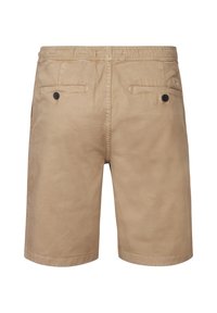 Tan bomuldsshorts med elastisk talje, to baglommer med sorte knapper og lige skæring.