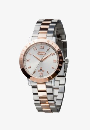Silver and rose gold metal watch with Roman numerals, a round face, and a mixture of brushed and polished link bracelet. Swift movement indicated.
