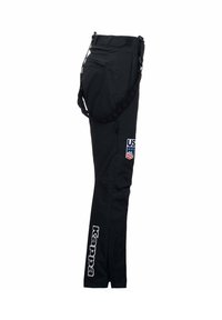 Pantaloni neri realizzati in un materiale liscio. Presentano un patch con il logo "US" e strisce, insieme al branding "Kappa" sulla parte inferiore della gamba.