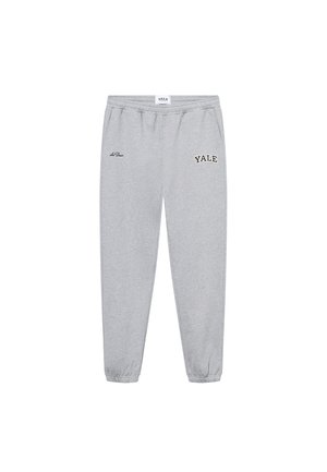 Grey sweatpants made from cotton blend, featuring an elastic waistband, side pockets, and embroidered "YALE" logo in black on the left leg.