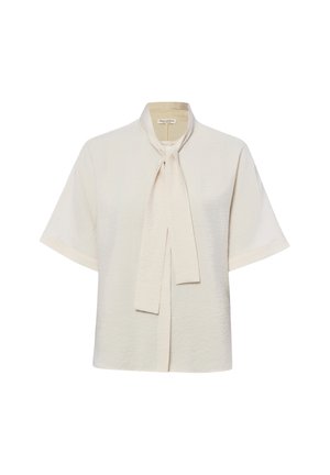 Kremowa bluzka z krótkim rękawem, z wysokim kołnierzem i wiązaniem z przodu marki Marc O'Polo, prezentowana na białym tle.