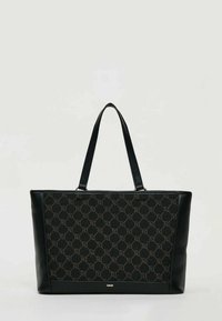 Borsa tote nera con motivo a nido d'ape in tessuto scuro, con lati in pelle nera liscia e manici lunghi in pelle. Logo dorato alla base.