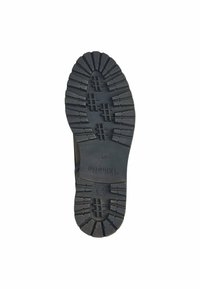 Black rubber sole with deep treads and a textured surface. Features the brand name "Tamaris" and size "37" embossed on the side.