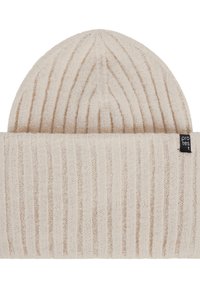 Beige knitted beanie with vertical ribbed texture. The top is rounded, featuring a tag with the word "protest" on the side.