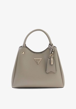 Grey leather Guess handbag with rounded top handles, triangular logo plaque, and attached keychain tag with brand name.