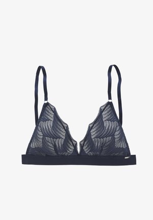 Marineblauwe kanten bralette met een diepe V-hals, gegolfde randen, verstelbare satijnen bandjes en een solide marineblauwe band onder de buste.