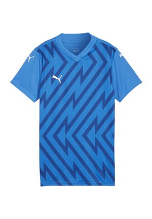 Maillot de football bleu en tissu léger, avec un motif en zigzag de bleu plus foncé, et des logos Puma blancs sur les manches.