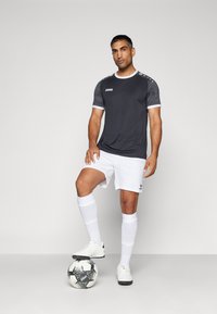 JAKO ICONIC - T-shirt print - schwarz/anthrazit
