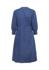 Džínová šaty s vyp puff sleeves, zadným yoke a prevlečeným pásom. Farba: tmavomodrá. Obsahuje elastické manžety a rozšírenú sukňu.