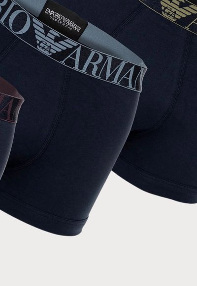 Black and dark blue stretch cotton boxer briefs with logoed elastic waistbands, featuring a smooth texture and fitted design.