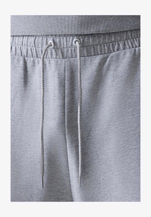 Graue Jogginghose mit Kordelzugverschluss, geripptem Bund und strukturiertem Stoff mit weichem Finish.