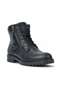 Bottines en cuir noir avec un bout arrondi, un laçage, une fermeture éclair sur le côté, et une semelle texturée avec un relief prononcé pour une meilleure adhérence.