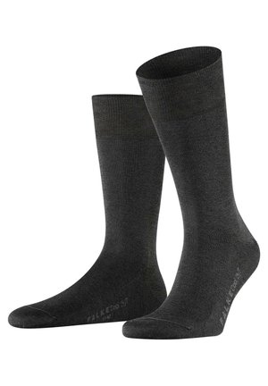 Dunkelgraue Knöchel-Socken mit glatter Textur, gerippten Bündchen und einem dezente Markenlogo auf der Sohle. Hergestellt aus weichem, dehnbarem Material.
