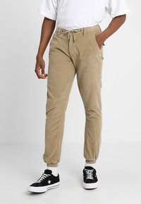Urban Classics CORDUROY JOG PANTS - Chinos tipa bikses - sand