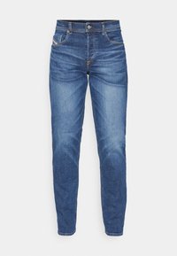 Jeans in denim blu con una vestibilità dritta, caratterizzati da leggeri sbiadimenti, cinque tasche e una chiusura con bottone in vita.