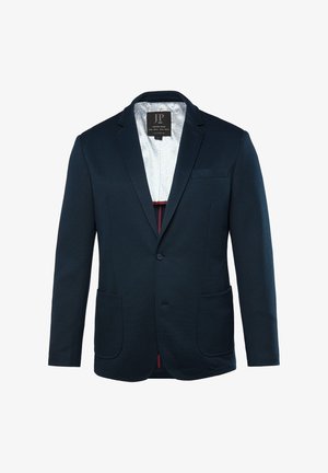 Marineblazer med et tekstureret stof, to frontlommer og en diskret mønstret foer. Har en enkelt knaplukning og strukturerede revers.