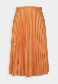 Jupe midi plissée orange avec ceinture élastique arborant le logo Lacoste répété autour de la bande.