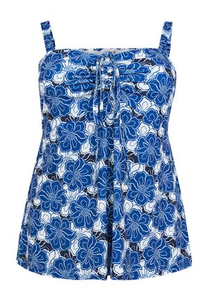 Blauw-wit bloemenpatroon mouwloos topje met verstelbare strik aan de borst en dunne schouderbandjes.