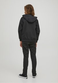 Jack & Jones Junior JJERUSH BLOCKING NOOS JNR - Allvädersjacka - black